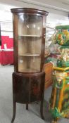 Aa mahogany dome front display cabinet.