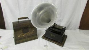 An Edison Gem Phonograph with horn, in need of attention.