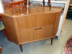 A retro corner television/entertainment cupboard