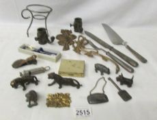 A mixed lot of metal ware etc., including animals, whistle, flatware etc.