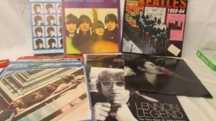 8 Beatles LP records including 2 Russian examples and 3 John Lennon LP records.