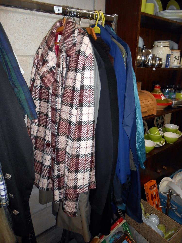 A quantity of casual jackets and overcoats etc.