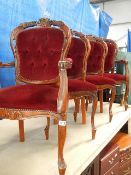 Four French style red buttoned velvet chairs including 2 carvers