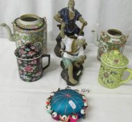 2 old Chinese teapots both a/f, 2 chocolate mugs with lids, 2 Chinese figures and a pin cushion.