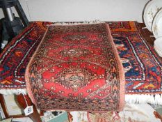 2 good quality prayer rugs.