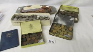 A large lot of old UK coins.