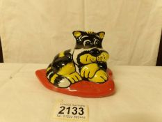 A Lorna Bailey yellow and black striped cat on heart shaped cushion, 12 cm.