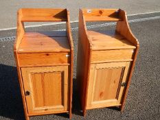 A pair of pine cabinets