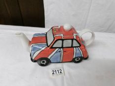 A Lorna Bailey limited edition, 20/50 taxi teapot a/f (chip to inside rim), with certificate, 13 cm.