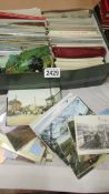 A box of assorted postcards including trains, transport, topographical etc.