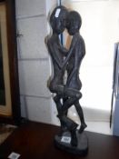 A carved African fertility figure height 52cm