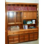 A Nathan teak wall unit with drawer/cupboard base 153cm x 46cm x height 194cm