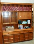 A Nathan teak wall unit with drawer/cupboard base 153cm x 46cm x height 194cm