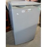 A working whirlpool fridge in grey (needs clean)