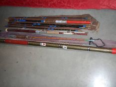 A mixed lot of fishing tackle including rods, nets, reel, box etc.