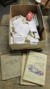 A box of cigarette cards including some in albums.