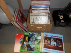 100+ LP records including Romanian, French, Spanish, USA, Brazilian,