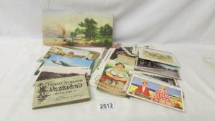 A mixed lot of old postcards etc.