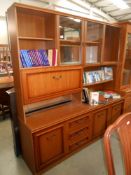 A vintage New Claredon wall unit by Stonewell furniture ltd Height 183cm,