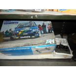 A boxed T2M Ford Escort RS Cosworth remote control car 1/10 scale,