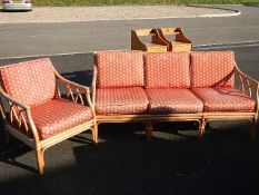 A cane 3 seater settee & one chair with cushions