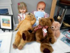 A vintage teddy in tired condition plus 3 others and 2 old dolls