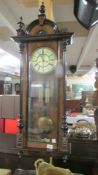 A Victorian mahogany double weight Vienna wall clock.