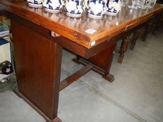 A 1940/50's oak draw leaf table.