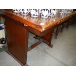 A 1940/50's oak draw leaf table.