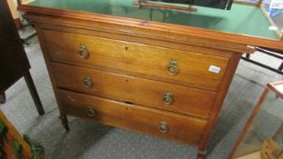 An oak 3 drawer chest.