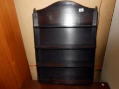 A dark wood plate rack/book shelf unit 55cm x 15cm x height 80cm