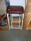 A vintage kitchen stool/step ladder