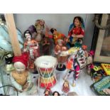 A collection of Indian dolls etc.