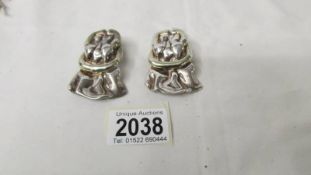A pair of circa 1990's unusual design silver clip on earrings.
