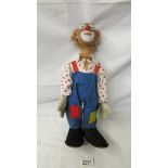 A rare early 20th century clown doll (possibly Steiff), in good condition for age, 40 cm tall.