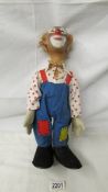 A rare early 20th century clown doll (possibly Steiff), in good condition for age, 40 cm tall.