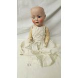 A porcelain headed doll with composition body, missing wig, marked S PD(in star) H, B8, Germany,