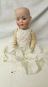 A porcelain headed doll with composition body, missing wig, marked S PD(in star) H, B8, Germany,