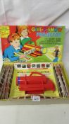 A Chad Valley third edition Give a Show projector complete with colour slides.