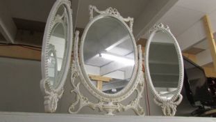 A French style 'shabby chic' triple dressing table mirror.