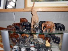 A large collection of ornamental elephants,