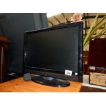 An Hitachi television 19" TV/DVD player,