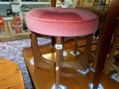 A vintage dressing table stool with dark pink velour seat height 46cm, diameter 46cm,
