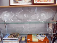 2 shelves of leaf pattern frosted glass dishes and a large 'fish' plate