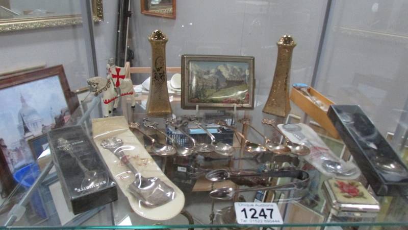 A mixed lot of souvenir spoons, salt and pepper etc.