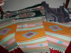 A selection of small rugs/place mats etc.