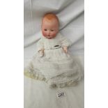 An AM Dream baby doll wearing a silver 'Baby' brooch, marked 351 / 5.K, 40 cm.