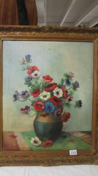An Anton Musin French oil on canvas still life with flowers, signed, framed.