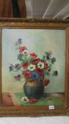 An Anton Musin French oil on canvas still life with flowers, signed, framed.