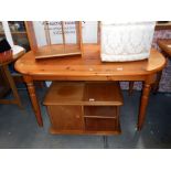 An oval pine kitchen table on turned legs 90cm x 148cm x height 75.
